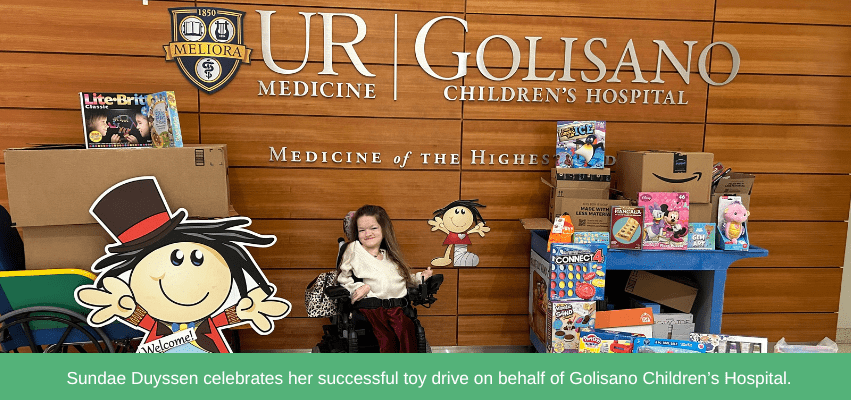 Sundae celebrates her successful toy drive on behalf of Golisano Children's Hospital.