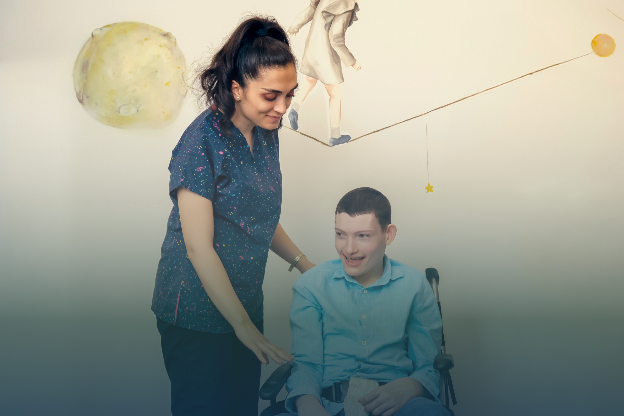 A woman stands beside a smiling boy in a wheelchair, gently placing her hand on his arm. The background features whimsical artwork of a person walking on a tightrope and a moon, symbolizing support and balance—much like the guidance offered through OPWDD provider resources NY.